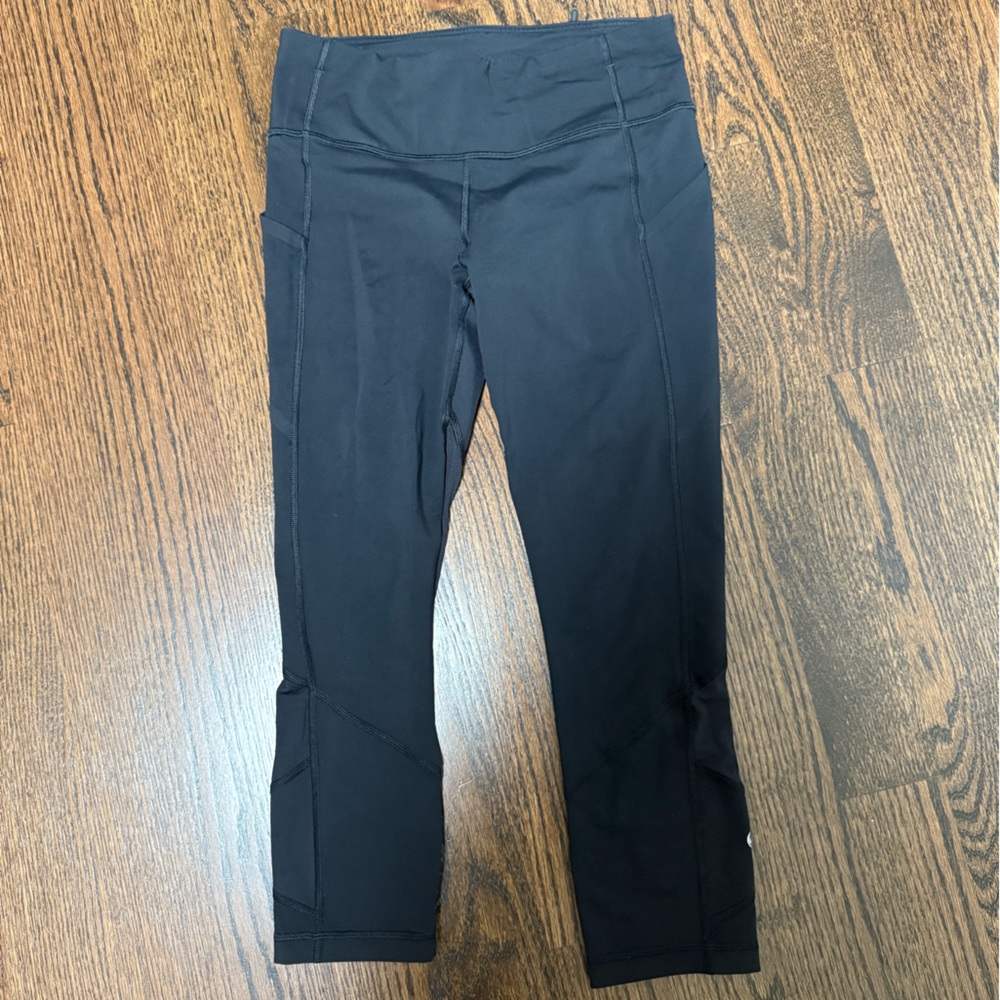Black lululemon mid rise leggings with pockets size 6
